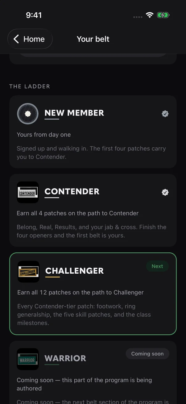 The ladder in the member's app says what each belt takes. Belts that aren't ready show "Coming soon".